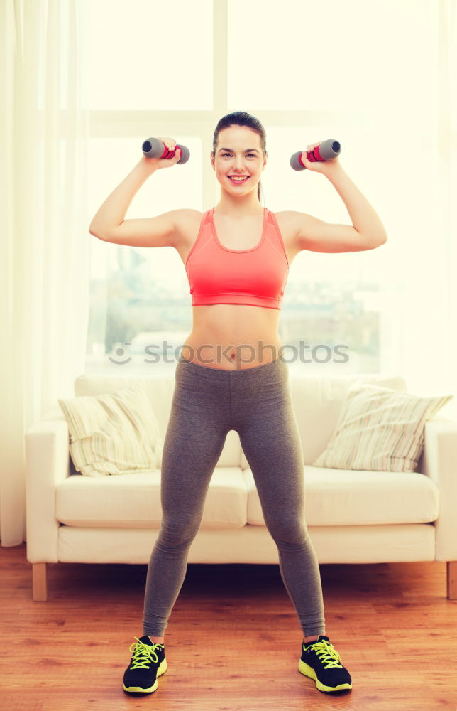 Similar – Young Woman working out outdoors and having fun