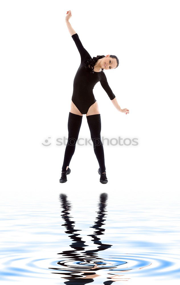 Similar – Young woman in a bathing suit lying in water