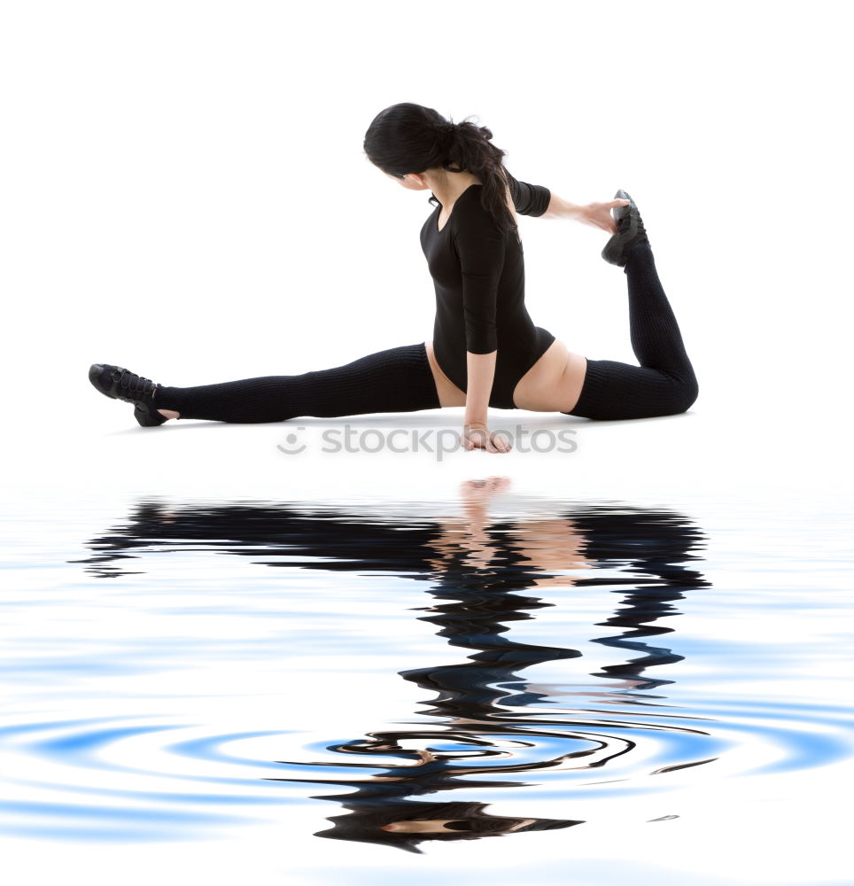 Similar – Image, Stock Photo Young rhythmic gymnast doing split jump during ribbon exercises.