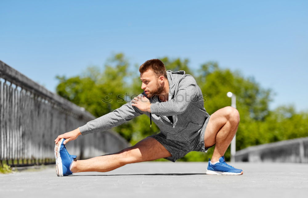 Similar – Image, Stock Photo Young man working out doing push-ups on a wooden park bench