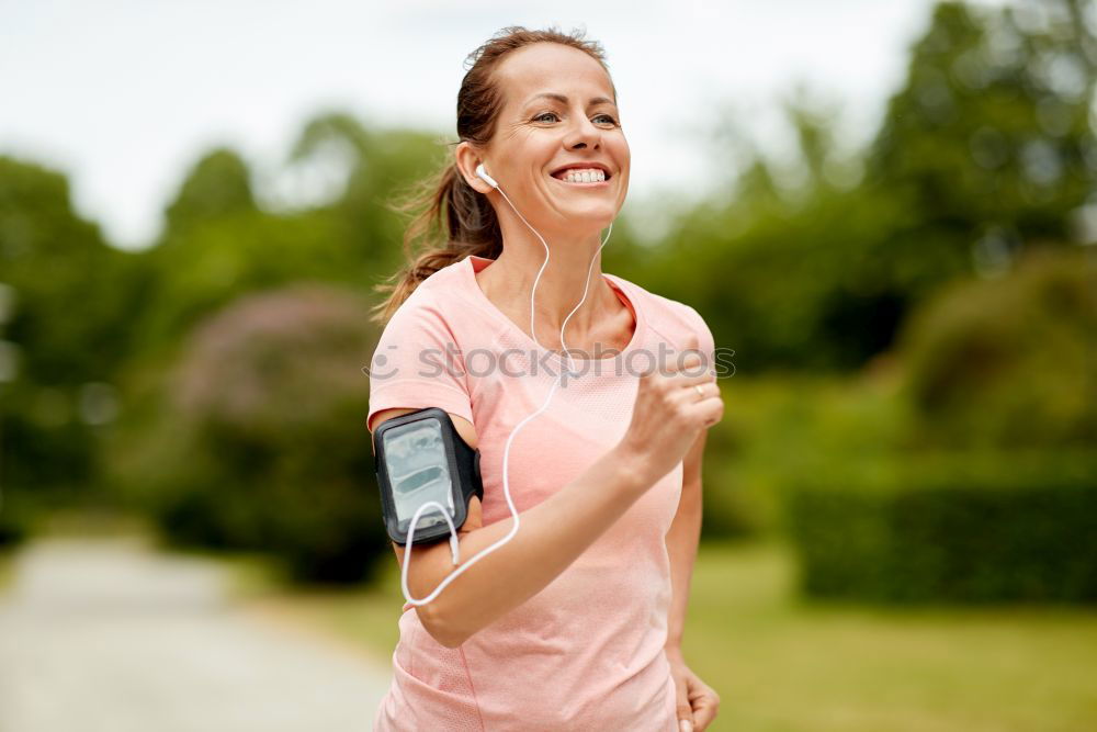 Similar – Image, Stock Photo Pretty Woman Jogging at the Park with Headphones