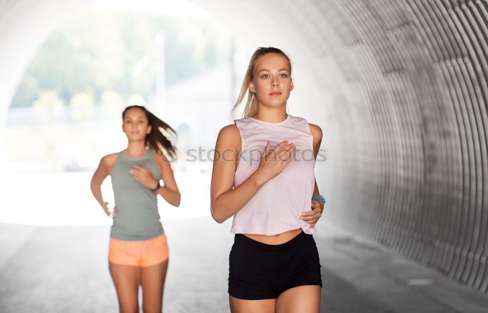 Similar – Athletic Women Drinking Water After an Exercise