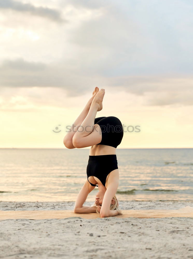 Similar – Image, Stock Photo Caucasian blonde woman practicing yoga in the beach