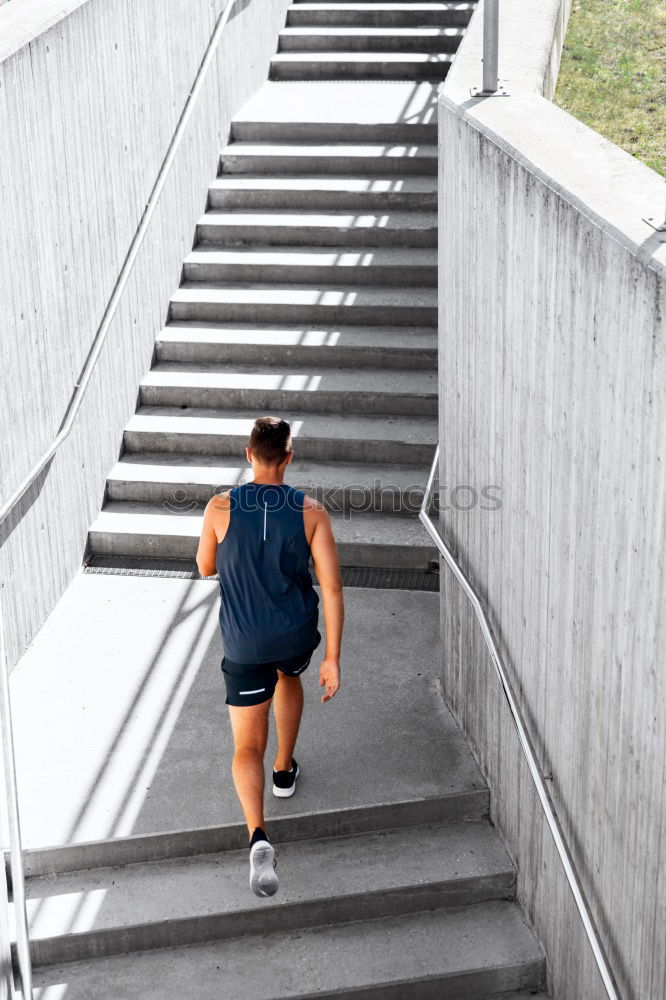 Similar – Image, Stock Photo Athletic woman running up stairs during cardio