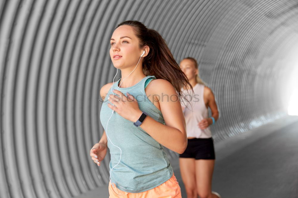 Similar – Athletic Women Drinking Water After an Exercise