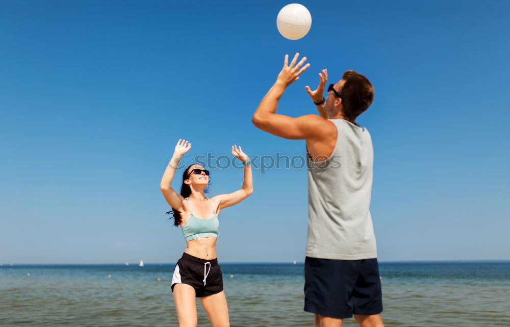 Similar – Happy young family of three at the beach