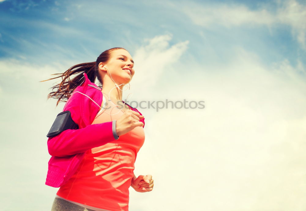 Similar – Cheerful woman running through field