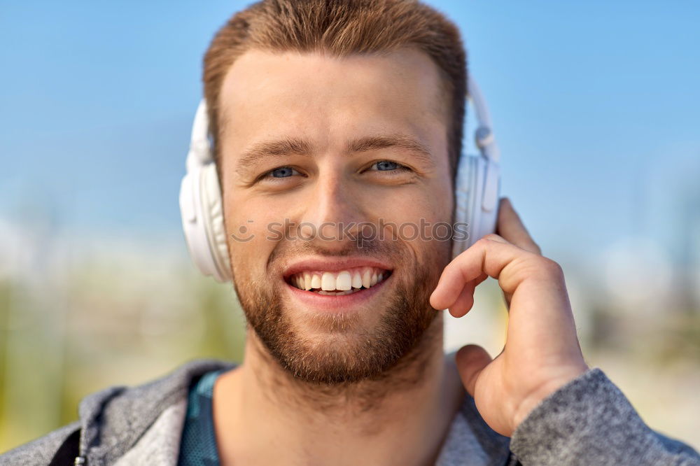 Similar – Image, Stock Photo Young man waiting listening music and using mobile phone at the airport with a suitcase.