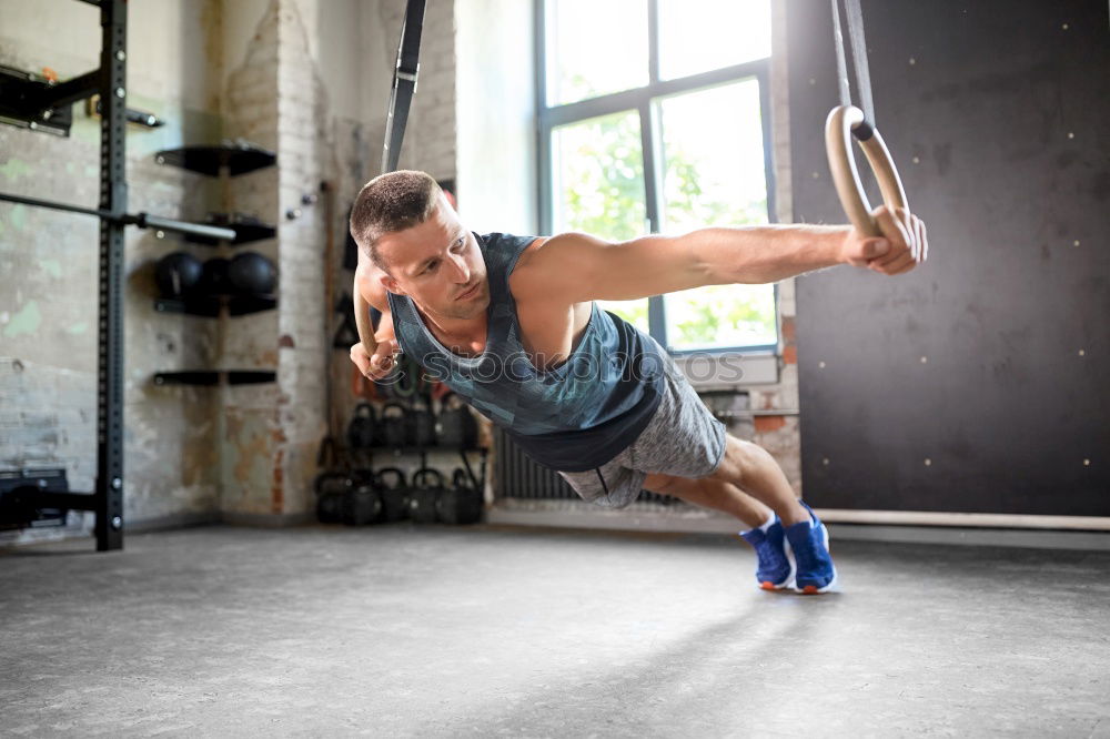 Similar – Image, Stock Photo Man doing suspension training with fitness straps