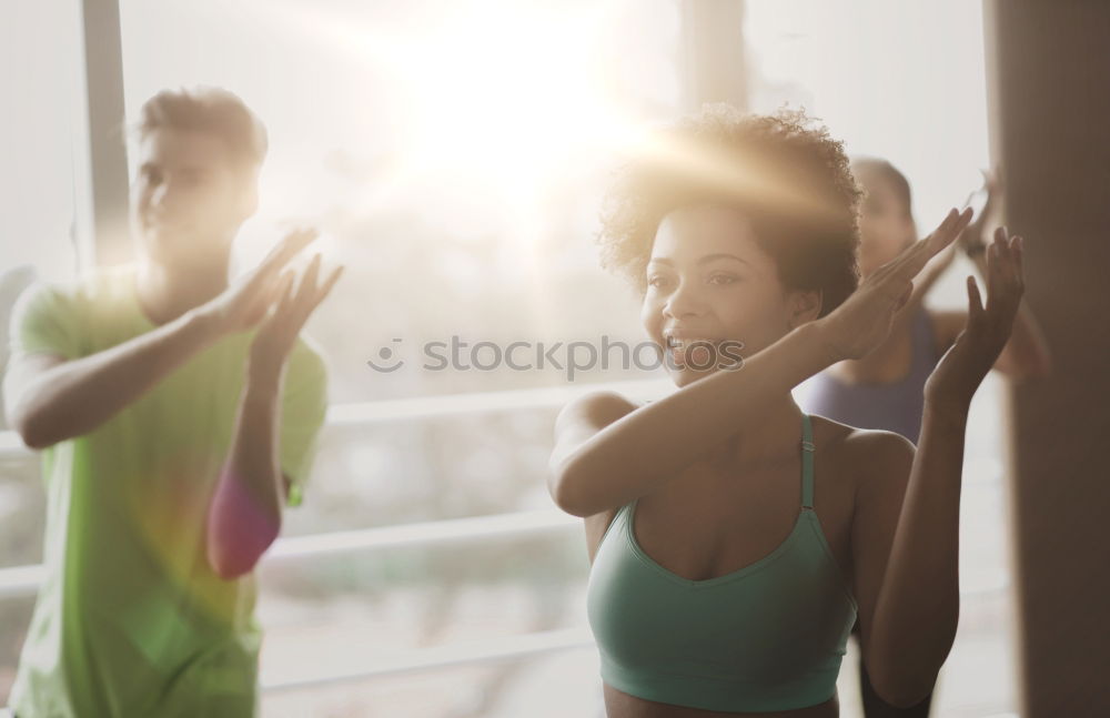 Similar – Happy friends sitting on steps