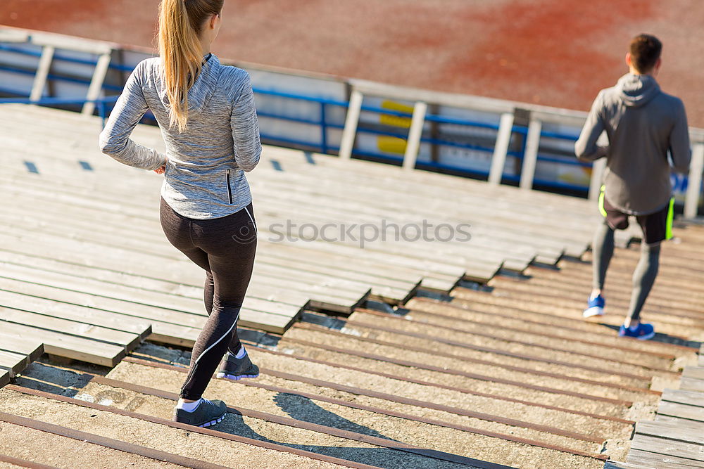 Similar – Two sportsmen running up stairs