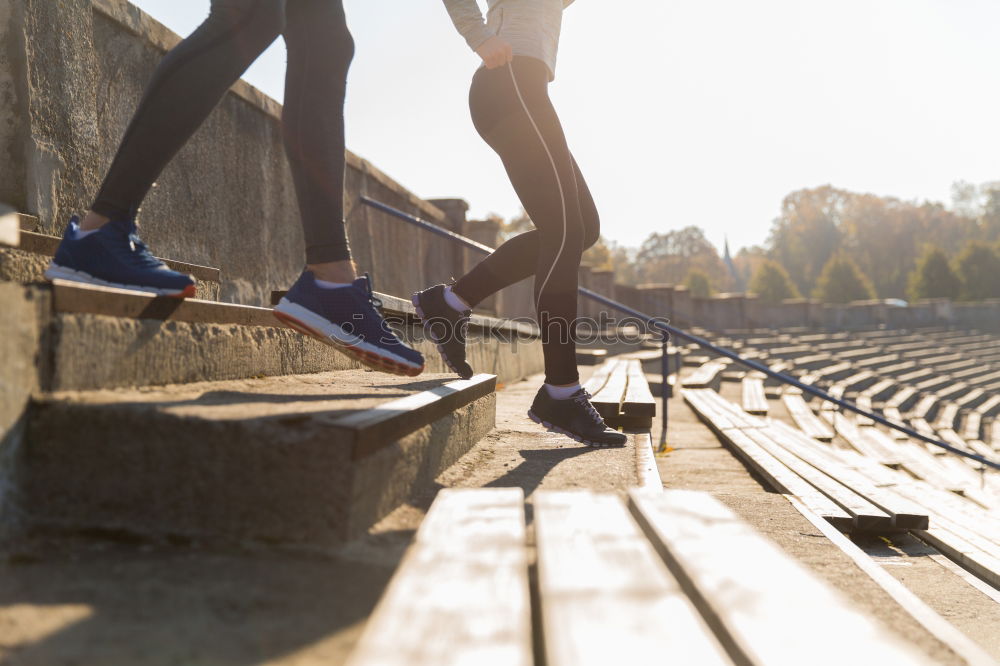 Similar – Two sportsmen running up stairs