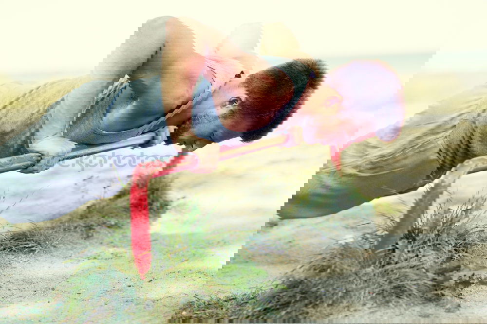 Similar – Image, Stock Photo Young man working out doing push-ups on a wooden park bench