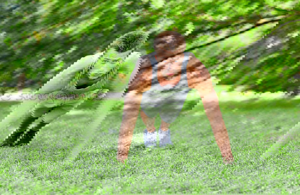 Similar – Image, Stock Photo Fit shirtless young black man doing legs stretching