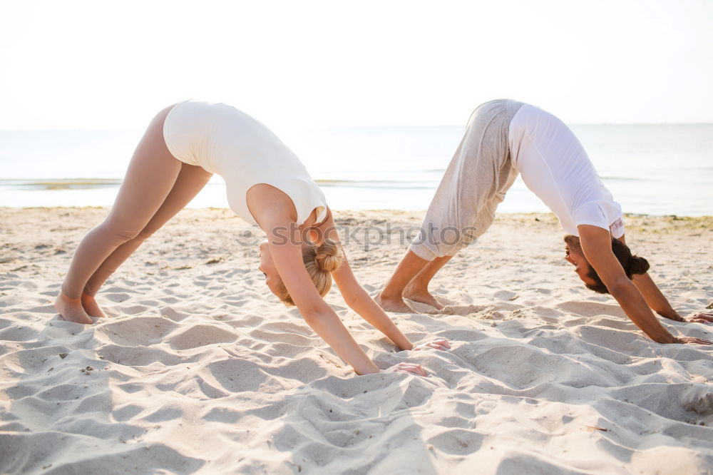 Similar – Two girls on the beach doing yoga at sunset. Lima Peru.