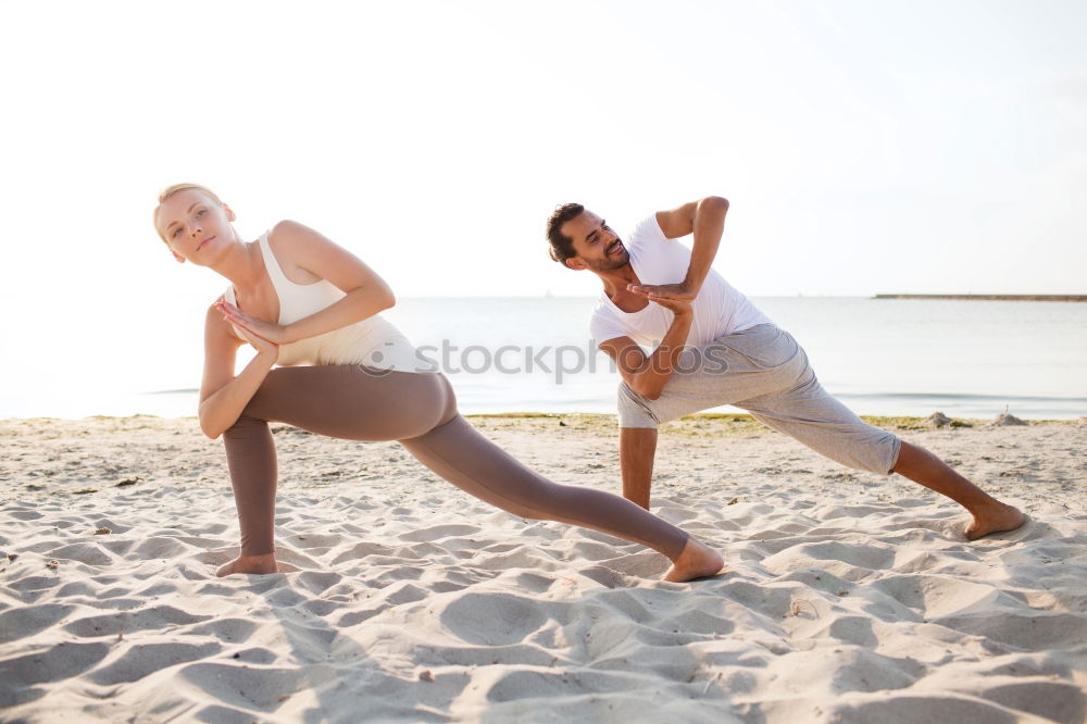 Similar – Two girls on the beach doing yoga at sunset. Lima Peru.