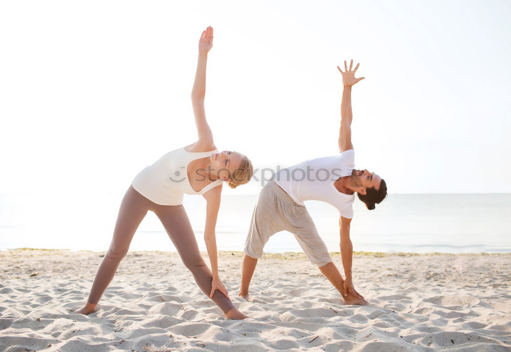 Similar – Two girls on the beach doing yoga at sunset. Lima Peru.