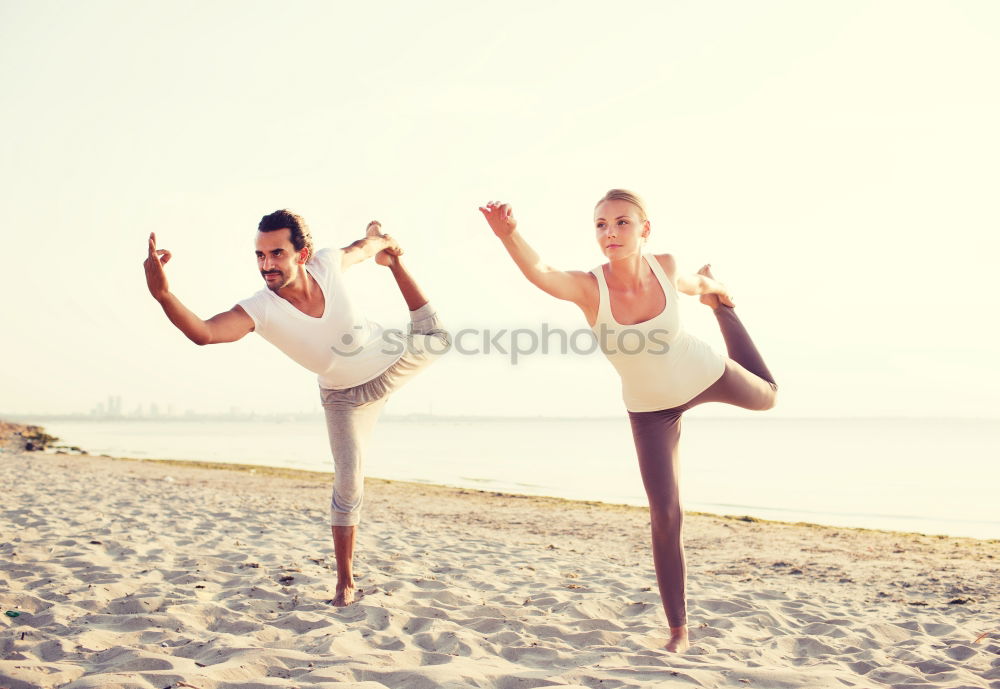 Similar – Two girls on the beach doing yoga at sunset. Lima Peru.