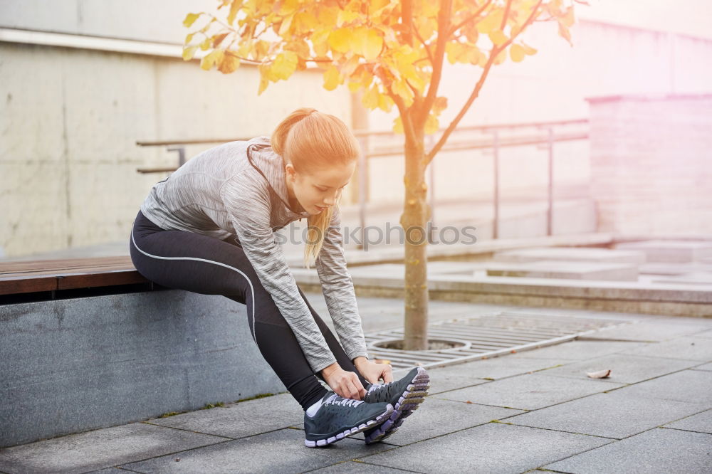 Similar – female runner resting