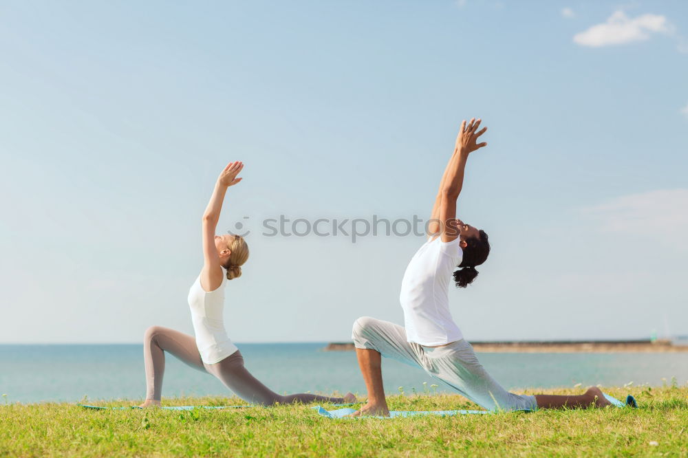 Similar – Image, Stock Photo Mother and daughter doing yoga exercises on the beach.