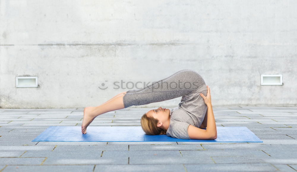 Image, Stock Photo woman doing yoga and pilates outdoor with her mat