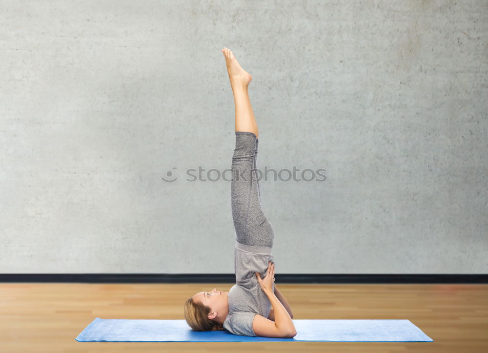 Similar – Frau macht Übung mit Yoga-Schaukel