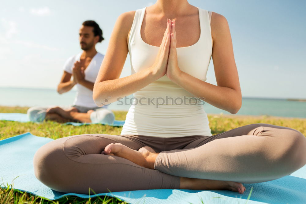 Similar – Image, Stock Photo Mother and daughter doing yoga exercises on grass in the park at the day time