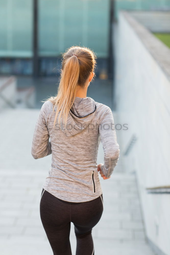 Similar – Image, Stock Photo Athletic woman running up stairs during cardio