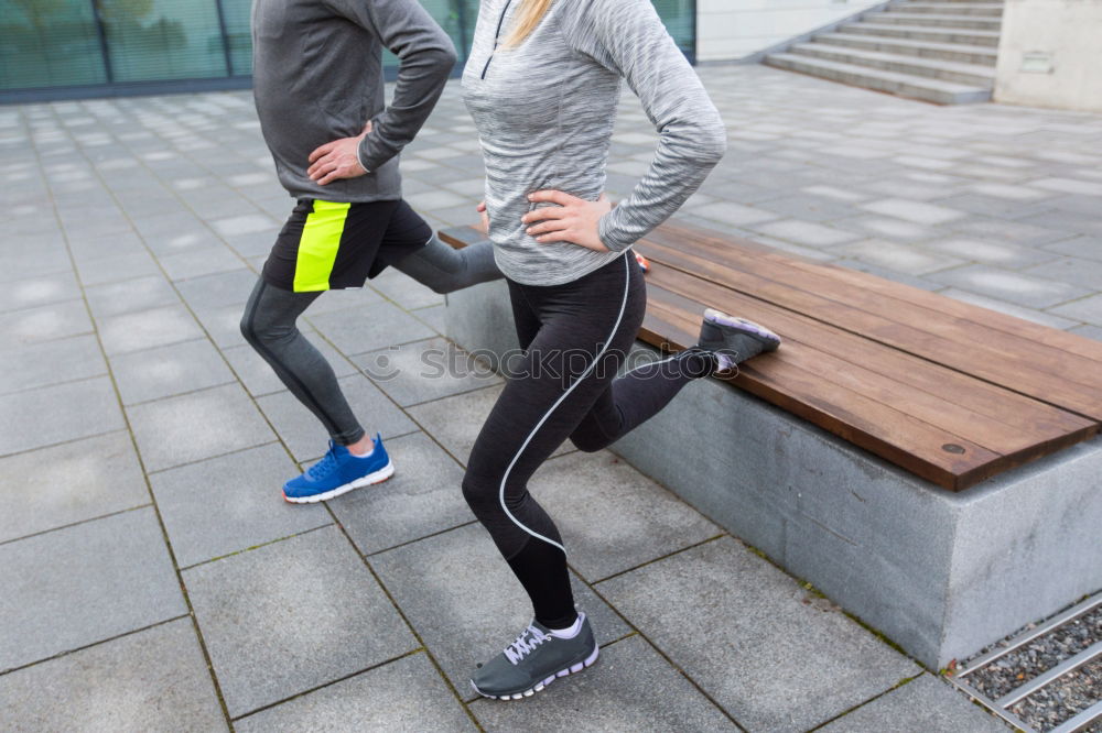 Similar – Woman stretching her body in front of ancient wall in park