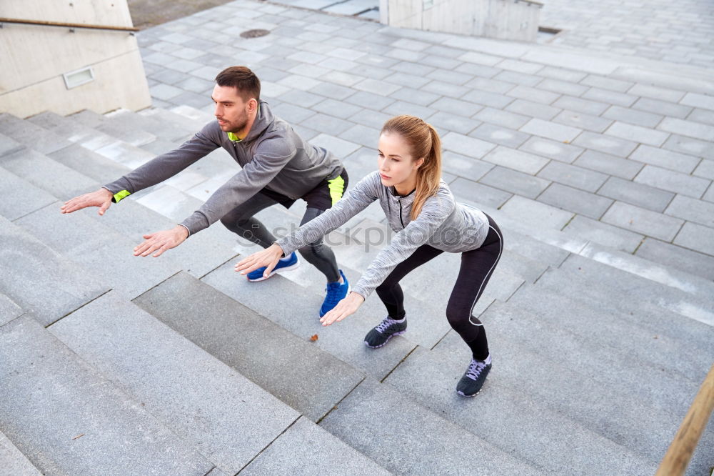 Similar – Image, Stock Photo Young couple exercising at the waterfront