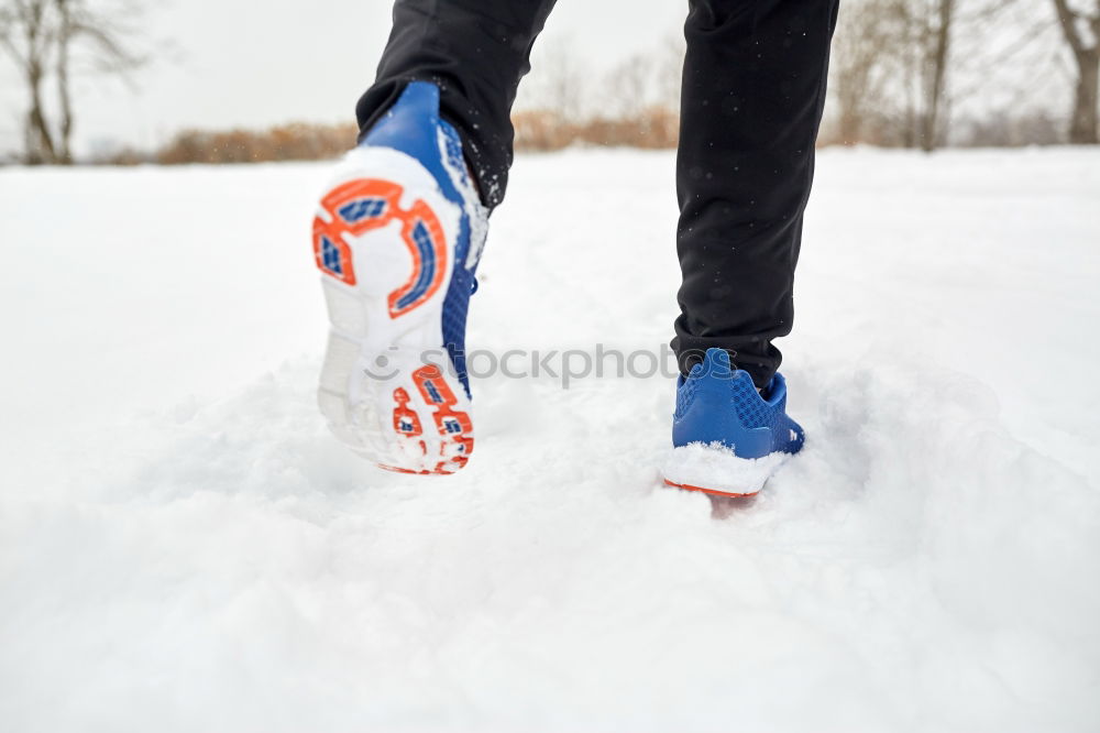 Similar – portrait woman boots on a road with snow in winter walking