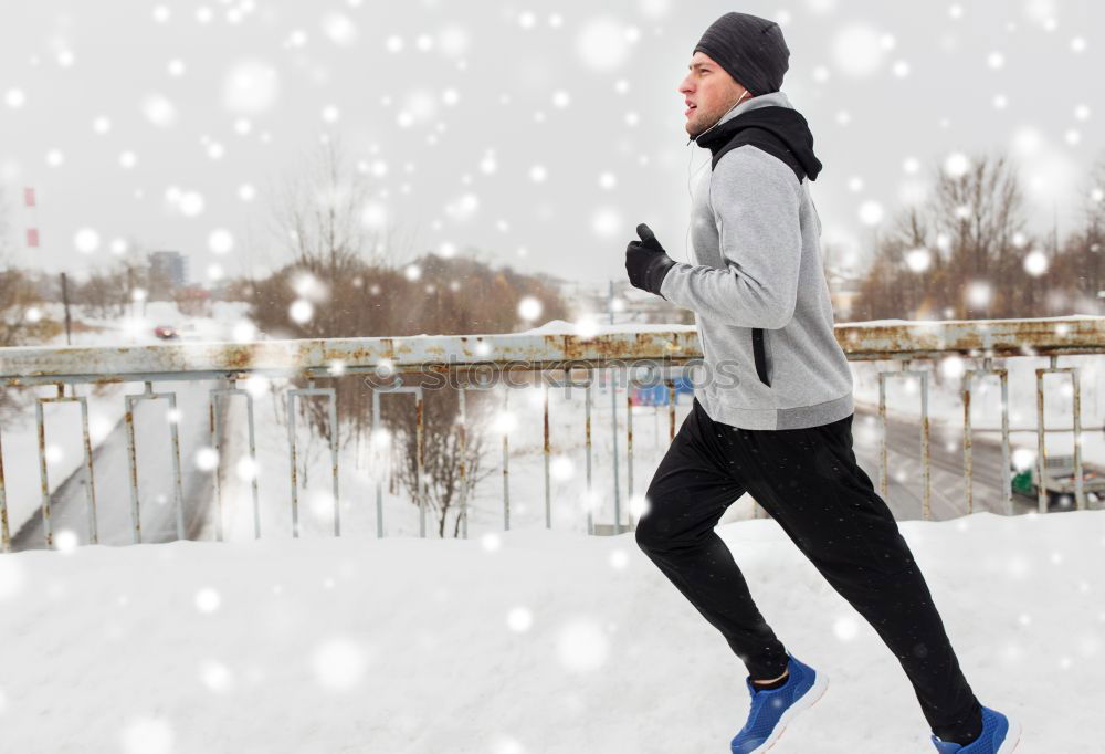 Similar – Man jogging in winter clothing