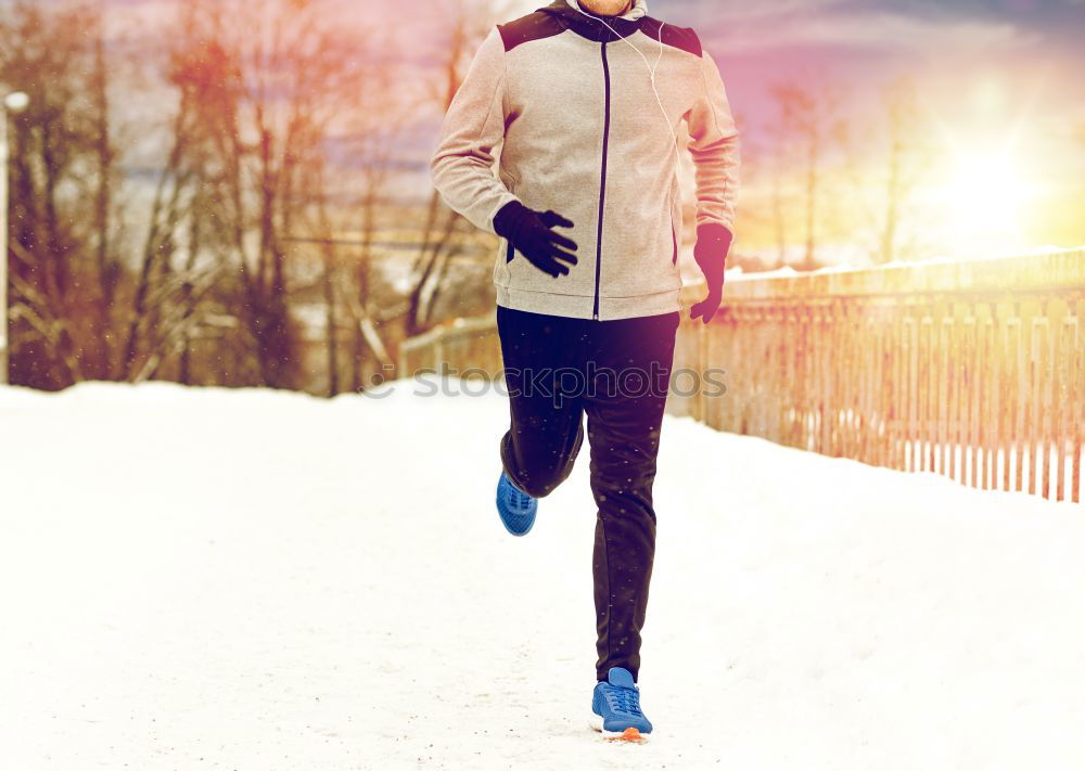 Similar – Man jogging in winter clothing