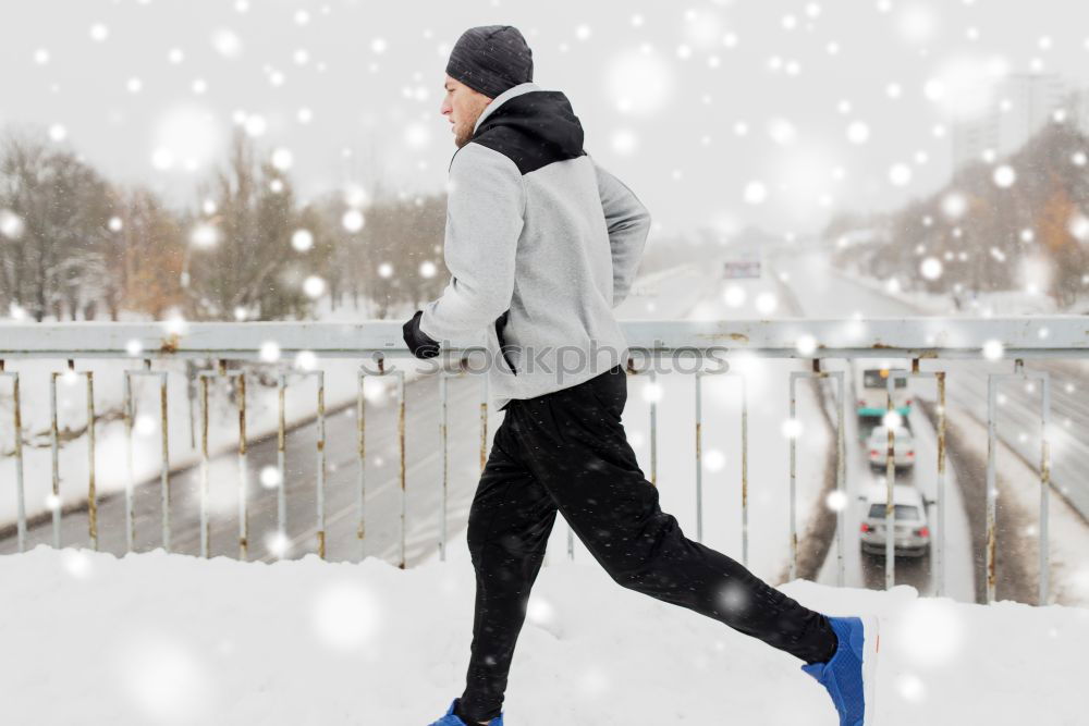 Man jogging in winter clothing