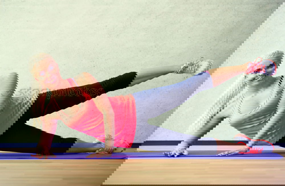 Similar – Image, Stock Photo Young sporty woman doing exercises with a latex band