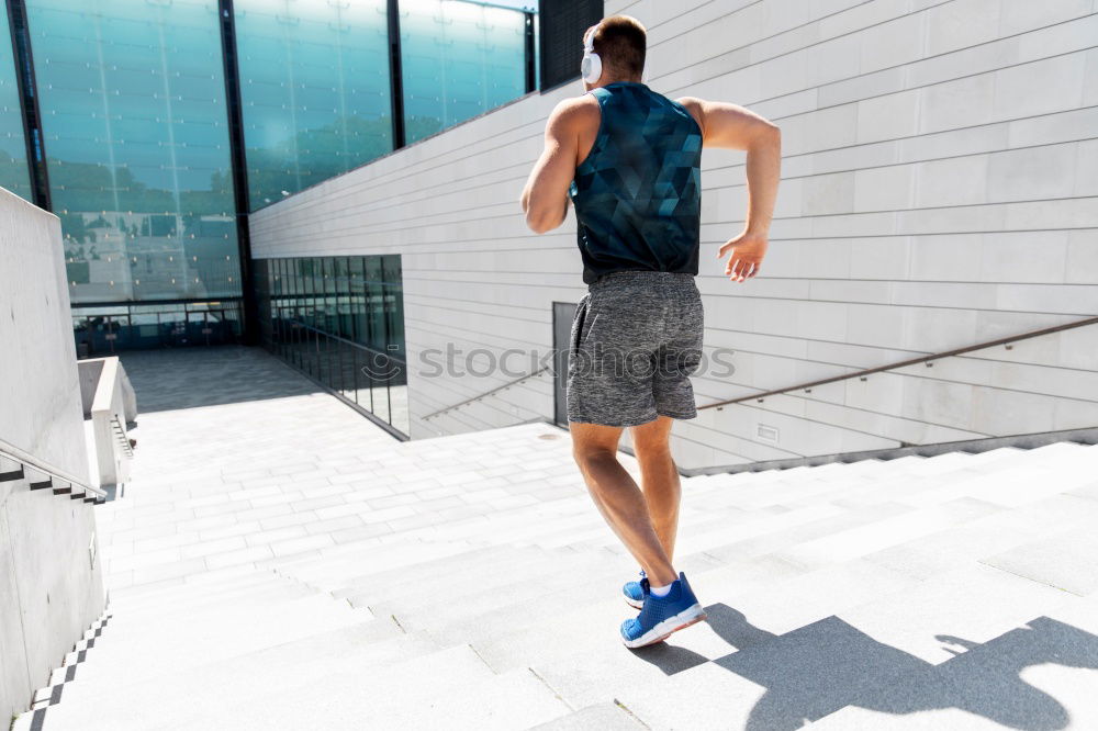 Similar – Black man running outdoors in urban road