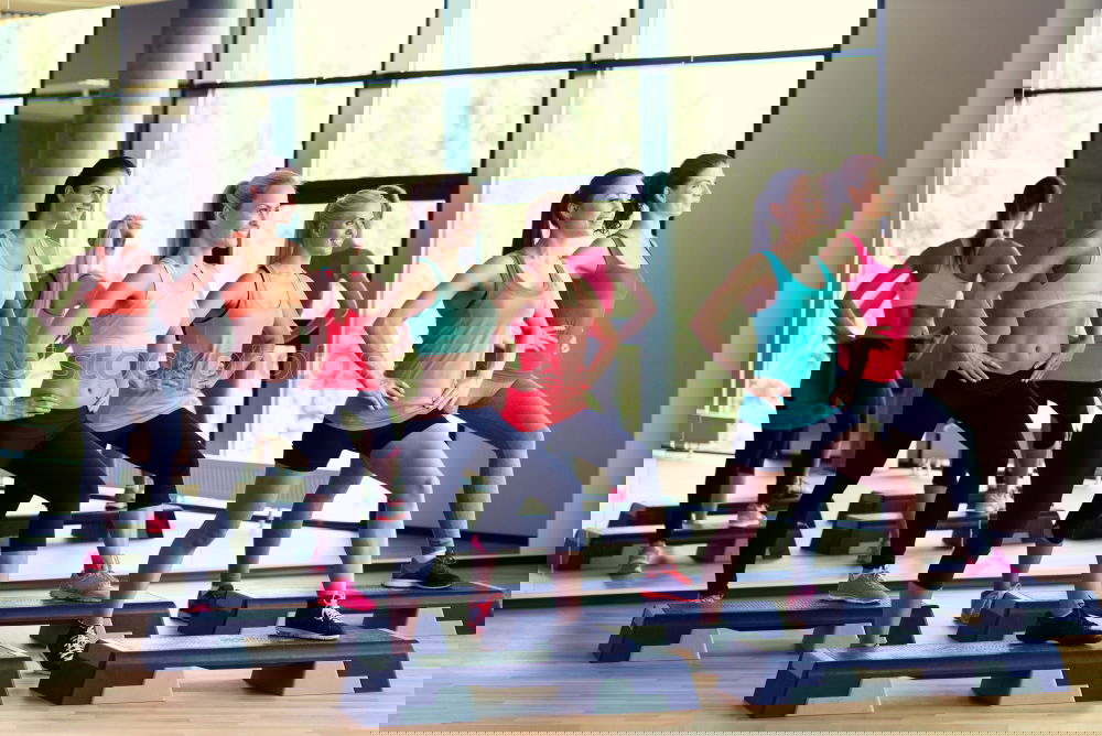 Image, Stock Photo Women group training over steppers in aerobic class