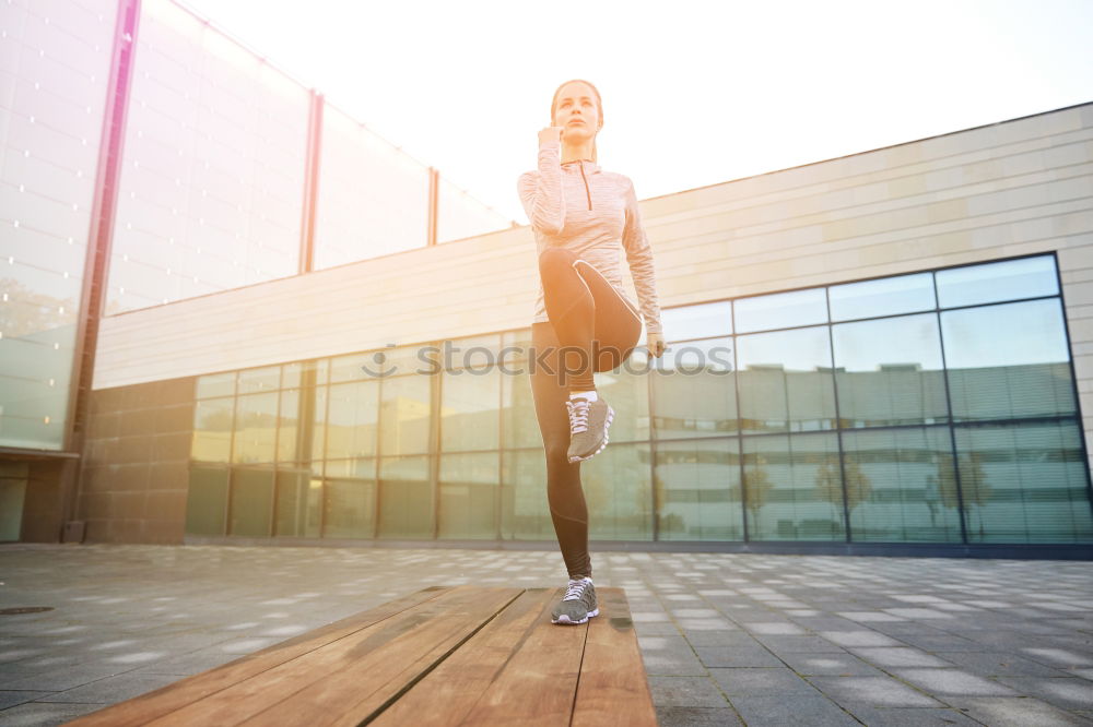 Similar – female runner jumping for joy