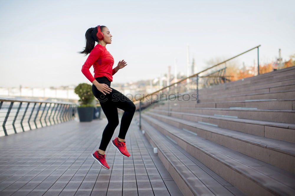 Similar – Image, Stock Photo Athletic woman running up stairs during cardio