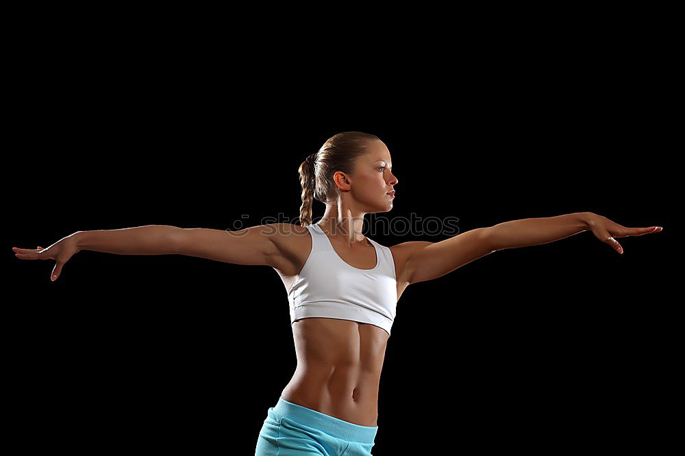 Similar – Close up side view profile portrait of one young athletic woman shadow boxing in sportswear in gym over dark background, looking away