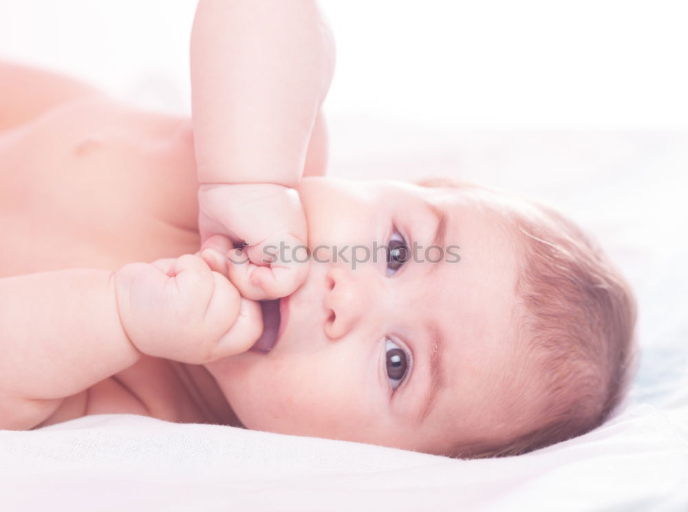 Similar – Portrait of a crawling baby on the bed in his room