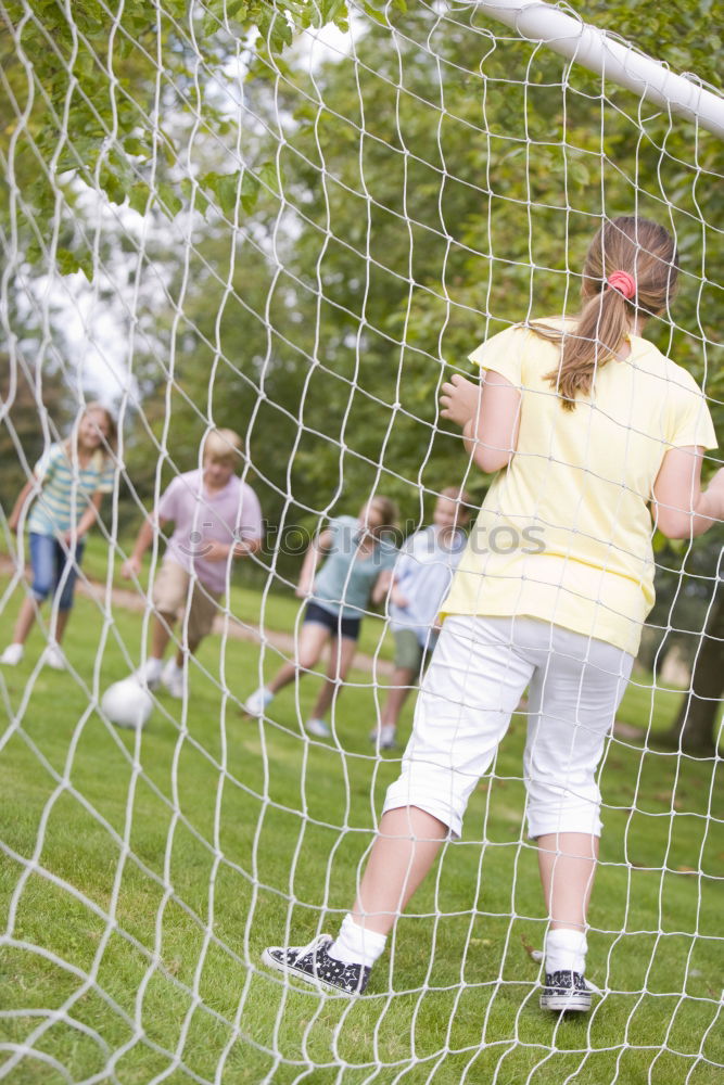 Similar – Kids Play Soccer, Boy, Girl, Goal