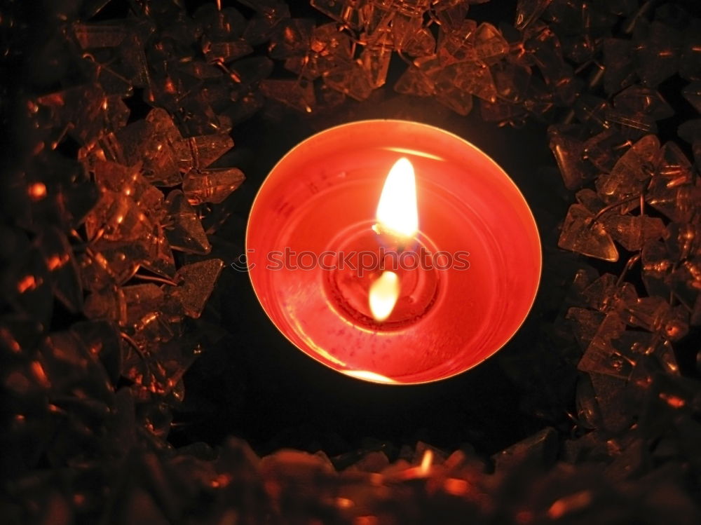 Similar – Image, Stock Photo two red burning candles stand one behind the other in front of a turquoise background