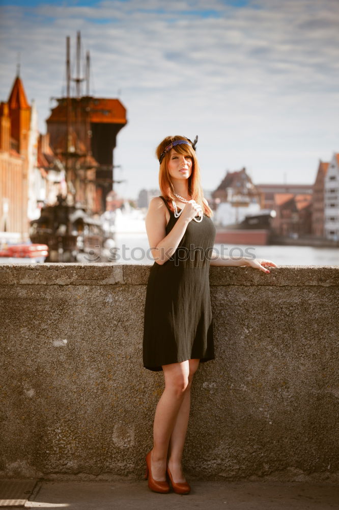 Similar – Young woman at harbor