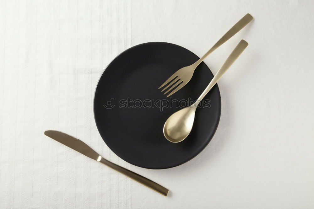 Similar – menu place setting with empty card and golden spoon over