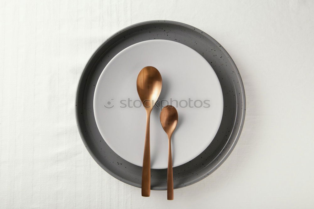 Similar – Festive golden cutlery knife and fork spoon in a white bottle