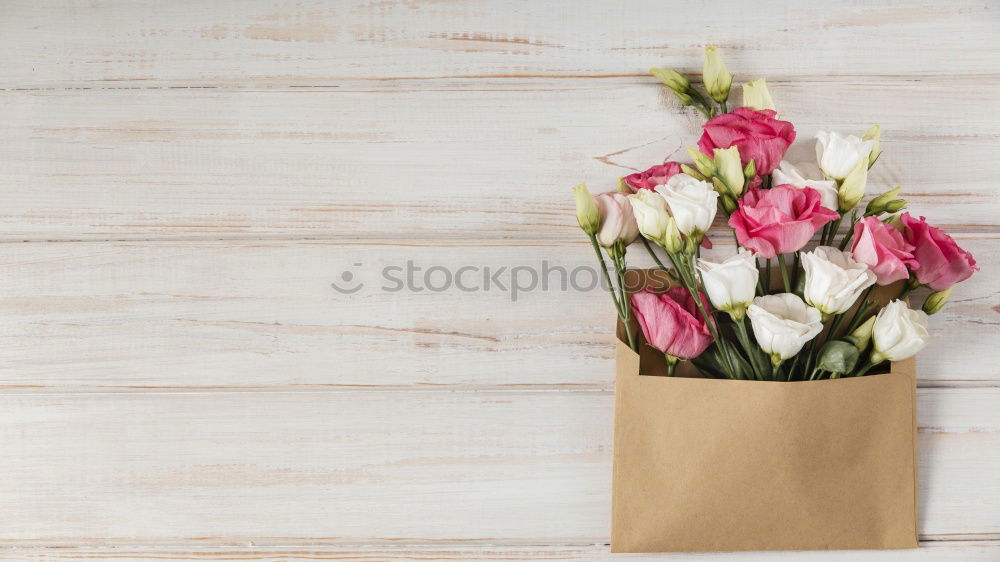 Similar – Bouquet of mixed flowers and a message card