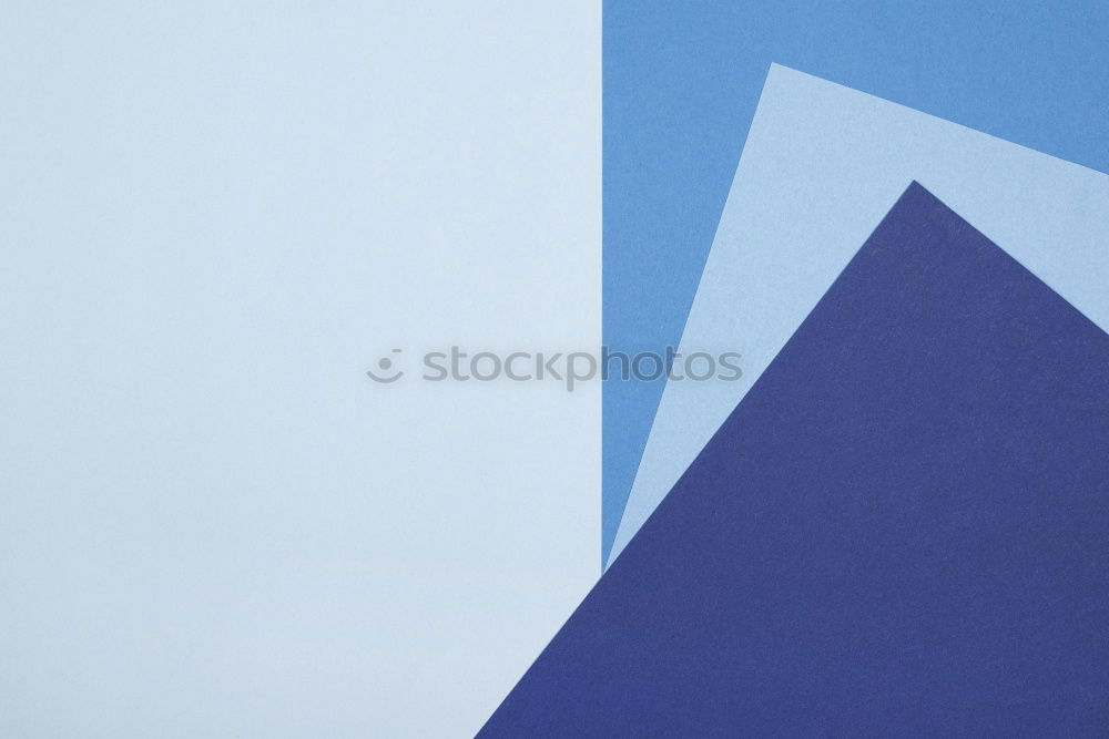 Similar – Blue and red paper mountain on white background