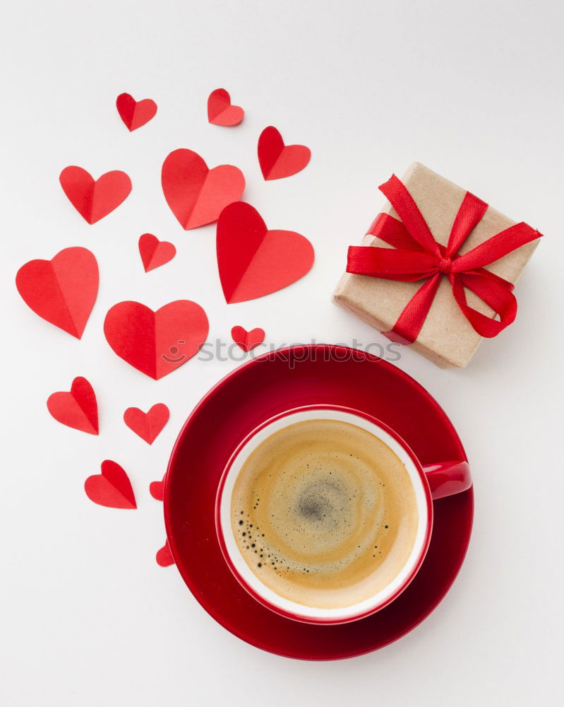 Similar – Tea cup with heart and falling colorful autumn leaves