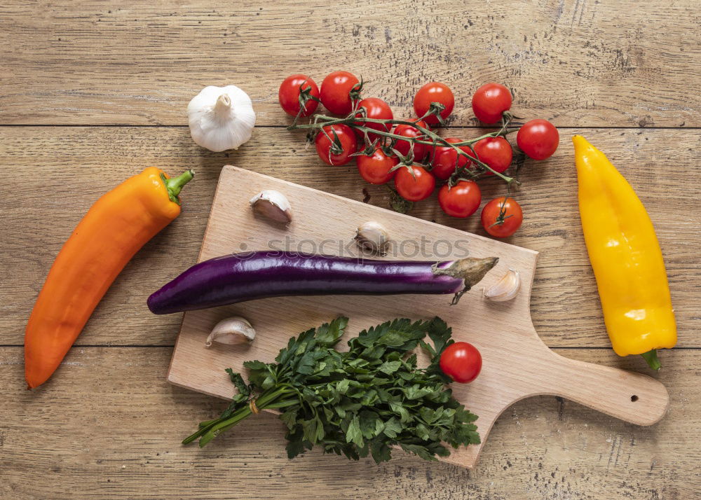 Similar – process of slicing carrots on slices on a kitchen board